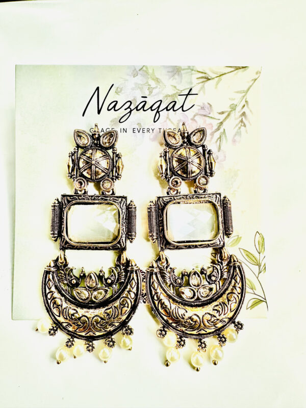 "Antique oxidized silver earrings with mirror centerpiece, lotus motifs, and pearl drops – Nazāqat handmade ethnic jewelry"