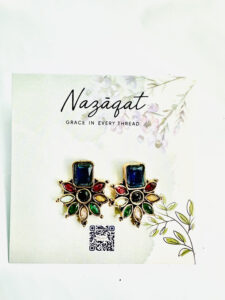 Multicolor floral stud earrings with rectangular blue stone in antique gold finish by Nazāqat