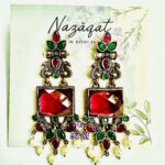 "Red and green oxidized ethnic earrings with mirror centerpiece and pearl drops – festive traditional jewelry by Nazāqat"