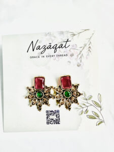 Red and green floral stud earrings with antique gold petal by Nazāqat Jewelry