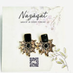 Black and gold floral stud earrings with antique finish and champagne petal stones by Nazāqat Jewelry