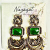 Handcrafted oxidized silver chandbali earrings with emerald green gemstone and pearl detailing by Nazāqat