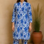 "Women’s blue and white floral printed rayon cotton cord set featuring V-neck kurta and matching tapered pants – Nazāqat ethnic wear"