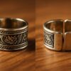 Unisex oxidized silver statement ring with intricate engraved floral pattern and open back design